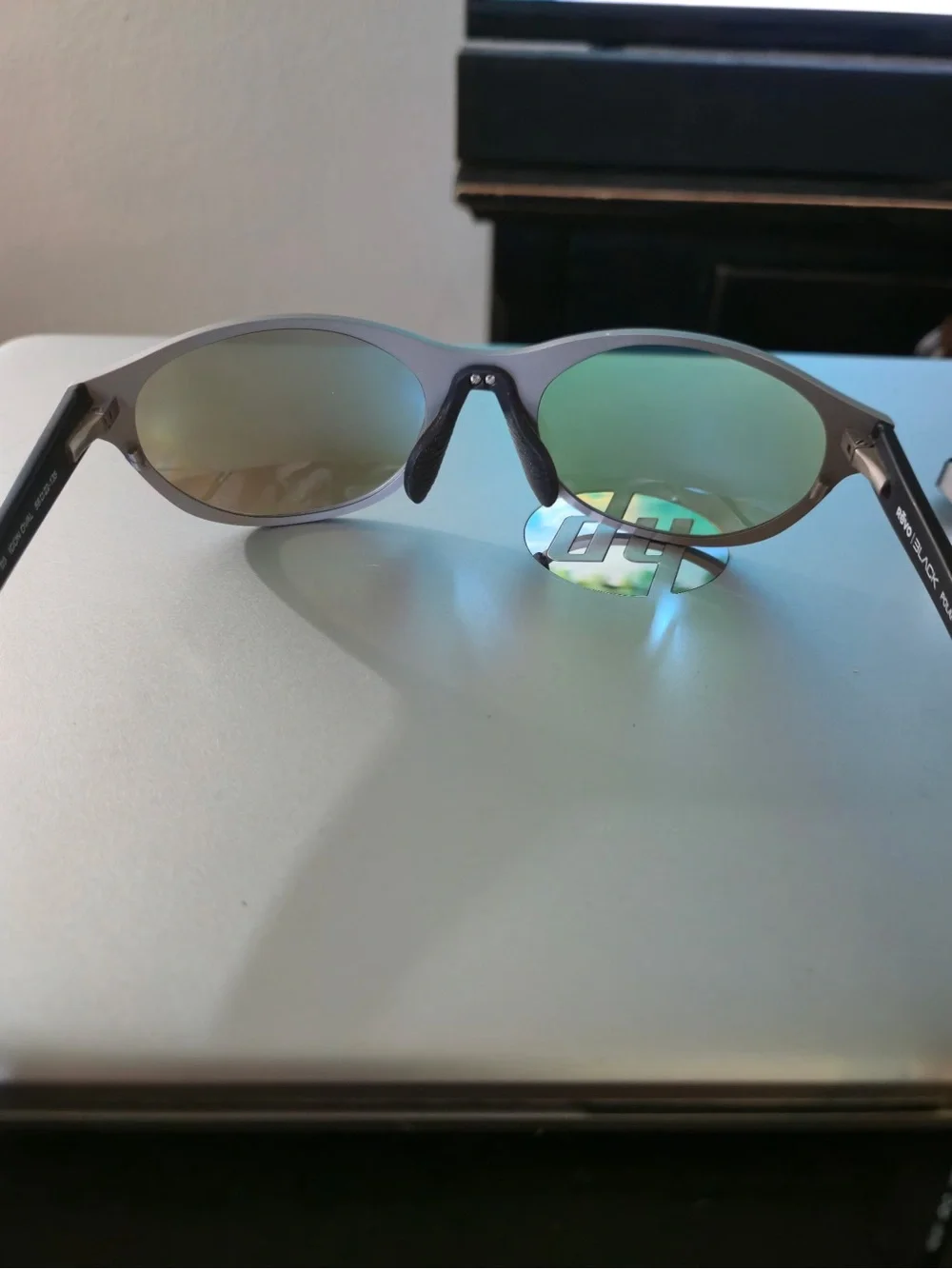 Revo Sunglasses - Satin Chrome Frame with Blue Mirror Lenses